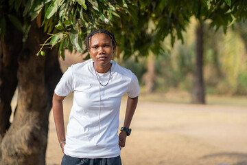 Portrait of a queer masculine black woman	