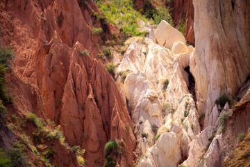 Natural unusual landscape red canyon of extraordinary beauty is similar to the Martian landscape. Multi-colored canyon fairy tale in Kyrgyzstan. Charyn Canyon. Amazing beautiful landscape.