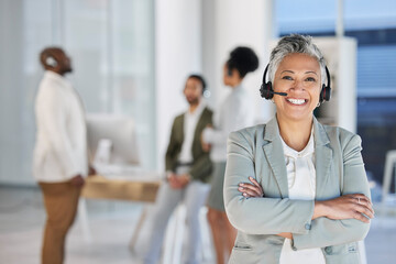 Senior woman, call center portrait and smile with arms crossed, teamwork and happiness by blurred...