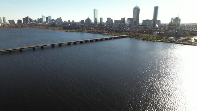 An aerial view of the Boston city skyline as seen from the Charles River