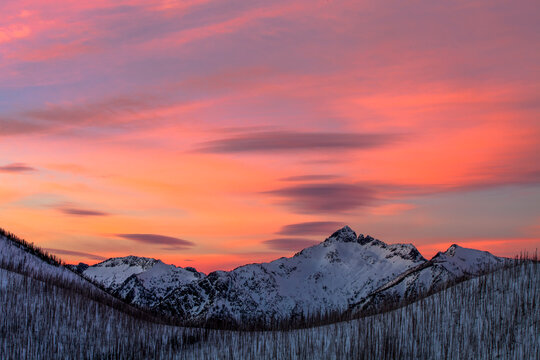The last rays of sun hit a peak calleed the Heavenly Twins in the Bitterroot Mountains of Montana.