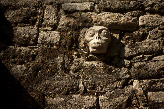 A skull sculpture decorates the Mayan city of Coba, Yucatan Peninsula, Mexico