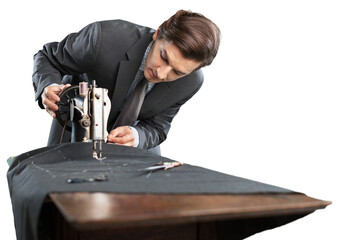 Tailors man at work working on clothes