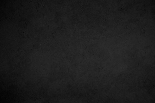 Close up retro plain dark black cement & concrete wall background texture for show or advertise or promote product and content on display. © siripak