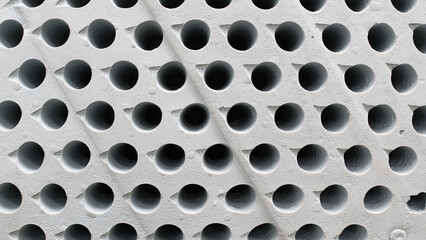 porous poriferous material for air ventilation with holes
