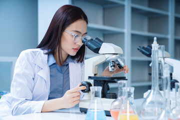 Image of young Asian woman working in the lab