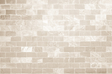 Cream and white brick wall texture background. Brickwork and stonework flooring interior rock old pattern design	

