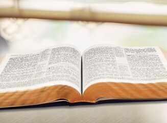 Fototapeta premium Open vintage old holy Bible book