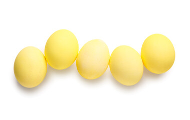 Yellow Easter eggs isolated on white background