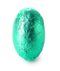 Easter egg in green foil on white background