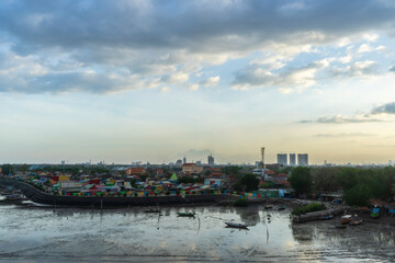 Obraz premium Sunset view of Kenjeran area, Surabaya city, Indonesia