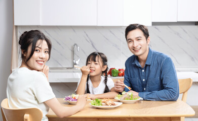 Obraz na płótnie Canvas Image of Asian family in the kitchen