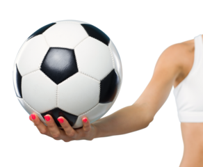 Sporty woman holding a soccer ball