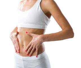 Beautiful fit woman touching her belly