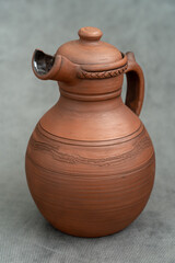 Ceramics, a ceramic product made with their own hands on a potter's wheel, a mug.