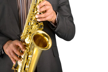 Obraz premium Saxophonist. Man playing on the gold saxophone