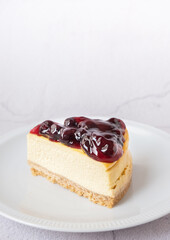 Slice of blueberry cheesecake 