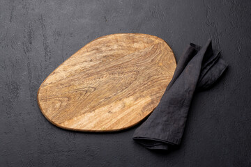 Wooden cutting board and kitchen towel