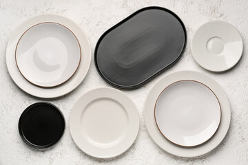 Obraz na płótnie Canvas Set of plates on white grunge background
