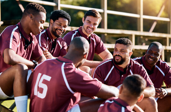 Rugby, men and sports team talking, relax and share ideas for training at a field. Fitness, friends and man group discuss game strategy before match, workout and planning, preparation and huddle - Powered by Adobe