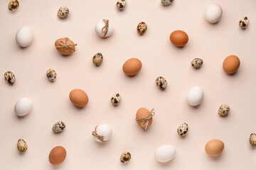 Different Easter eggs on pink background