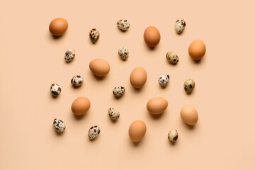 Many Easter eggs on beige background