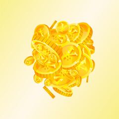 Chinese yuan coins falling. Scattered gold CNY