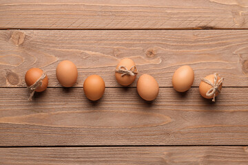 Easter eggs on brown wooden background