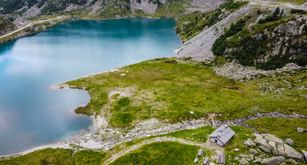 Lake Pian Palù, with its unmistakable emerald-coloured waters, is one of the iconic places in Sole Valley, Stelvio National Park, Trentino Alto Adige, Italy