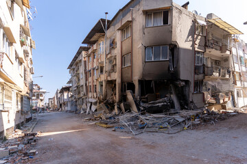 Fototapeta na wymiar demolition of an abandoned house after an earthquake