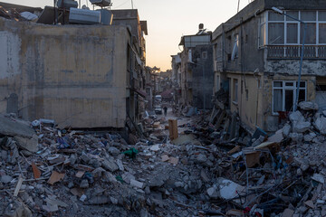 demolition of an abandoned house after an earthquake
