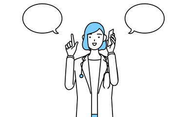 電話をしながら指さしをする白衣を着た女性医師