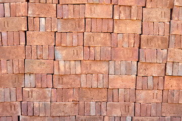 Pile of red bricks texture background