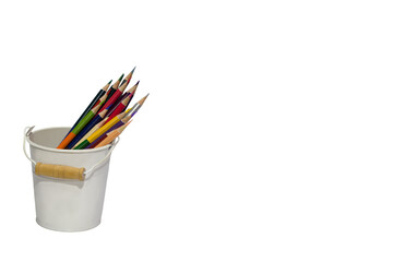 Close-up PNG file of multi-colored crayons in small tins ready to be used to paint in various artworks.