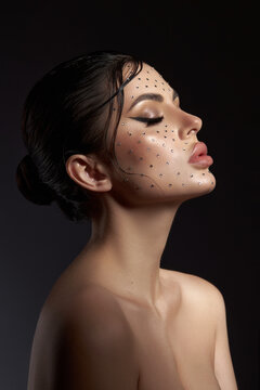 Beauty face woman makeup rhinestones lips. Contrasting portrait of a beautiful woman, wet hair styling. Clean facial skin