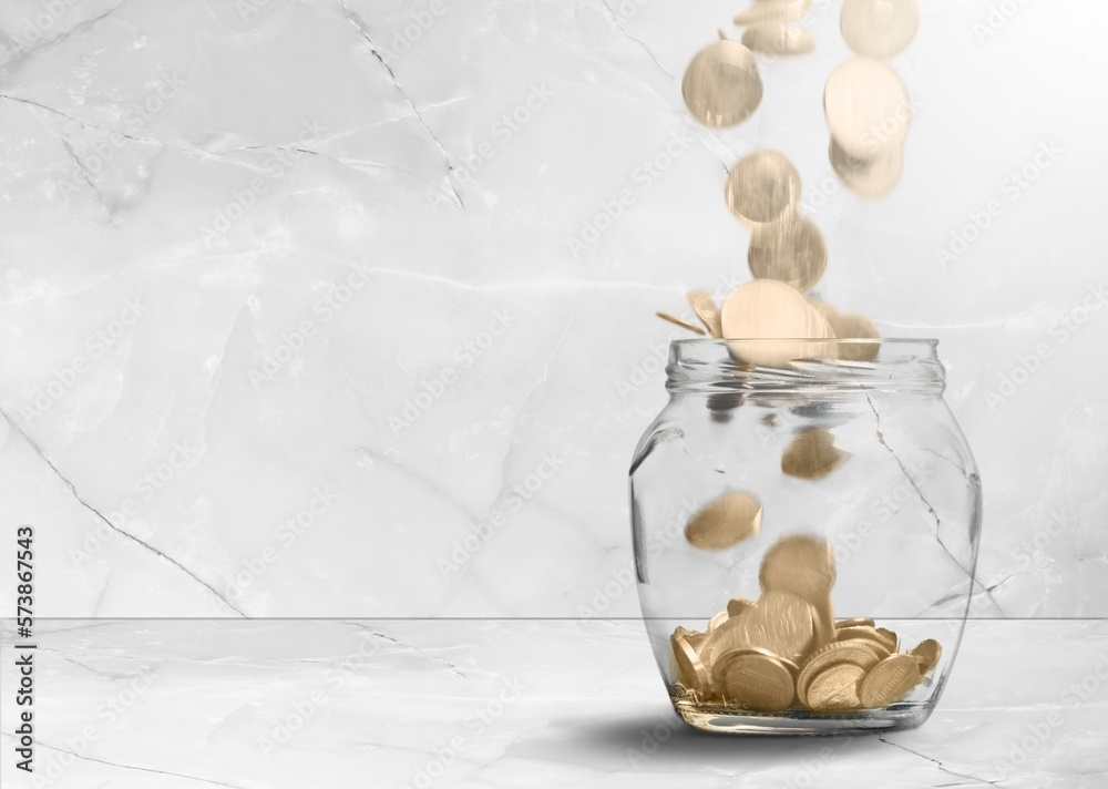 Poster Golden coins in jar on white desk