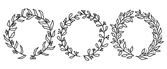 Hand drawn vector round frame. Floral wreath with branches. Decorative elements for design in doodle style