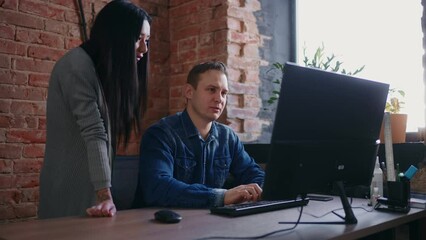 Multiethnic Office Workers Discussing Project And Solving Problems Together, People In Loft Office
