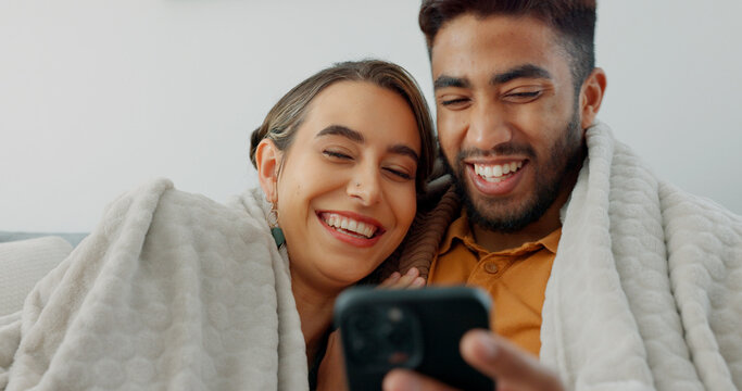 Happy, couple with phone for communication, networking or social media app at home. Movie, video or love man and woman relax in living room streaming online, internet or website with smile in house