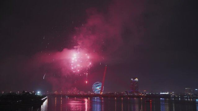Huge fireworks light up sky for Lunar New Year and Tet holiday over Han River in Danang, Vietnam.