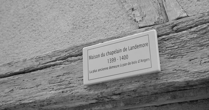 Landemore Chaplain's House Sign - Oldest Half-timbered House In Angers, France. Black and White. closeup