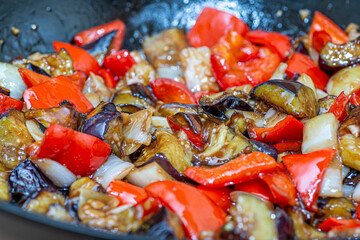 Obraz na płótnie Canvas Grilled vegetable salad with zucchini, eggplant, onion, pepper and tomato