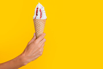 summer yummy icecream cone isolated on yellow, advertisement banner with copy space.