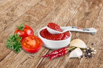 Ripe tasty fresh tomatoes and sauce.