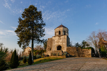 Fototapeta na wymiar Bell tower in Khobi Convent, Georgian Orthodox monastery XIII century