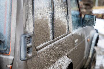 Dirty car side. Splash and texture of mud on a car. Mad splattered 4x4 SUV © Szymon Bartosz
