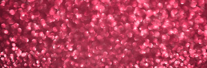 Viva magenta, pink sparkling glitter bokeh panoramic background banner, abstract defocused texture header. Holiday romantic lights