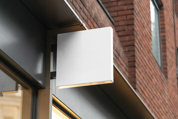 Blank square sign mockup in the urban environment, empty space to display your advertising or branding campaign