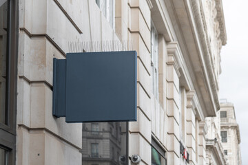 Blank square sign mockup in the urban environment, empty space to display your advertising or...