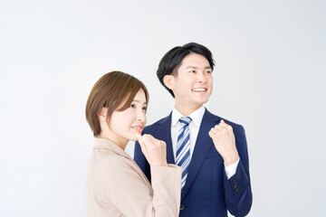 ガッツポーズするビジネスウーマンとビジネスマン　白背景